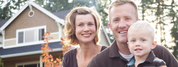 family of 3 in front yard