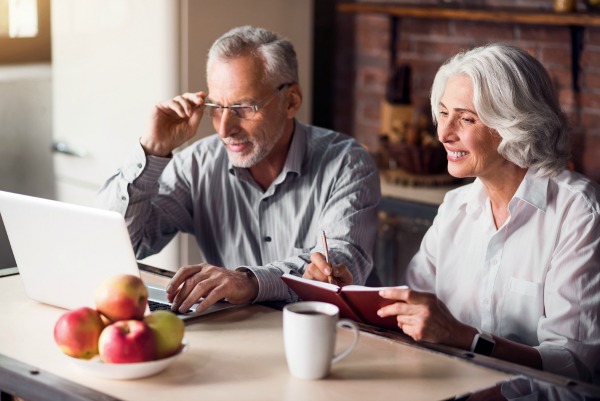 baby boomers looking at computer